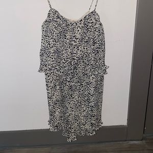 The Impeccable Pig Black and Beige Romper